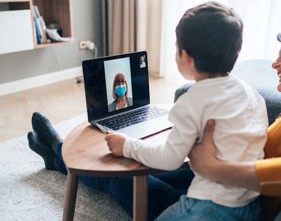 A woman and child on a video call
